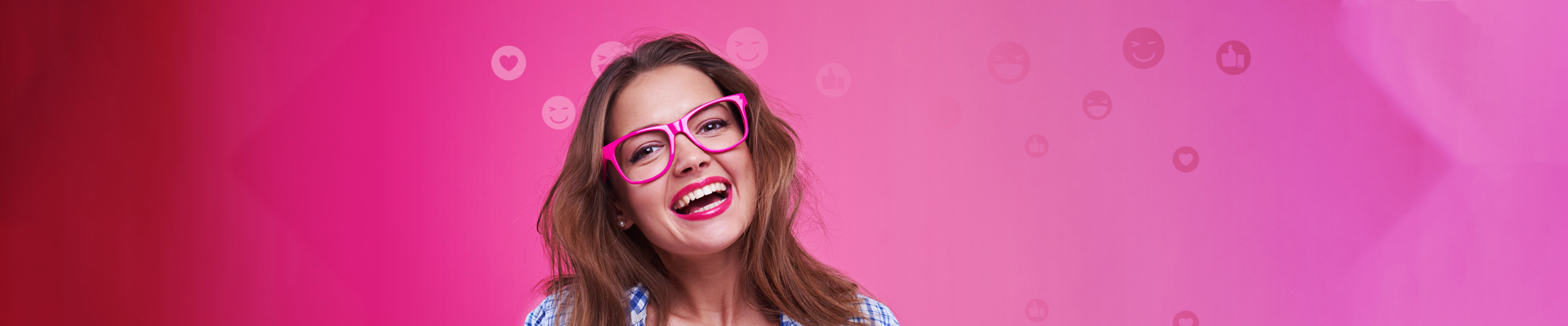 Woman in pink glasses smiling